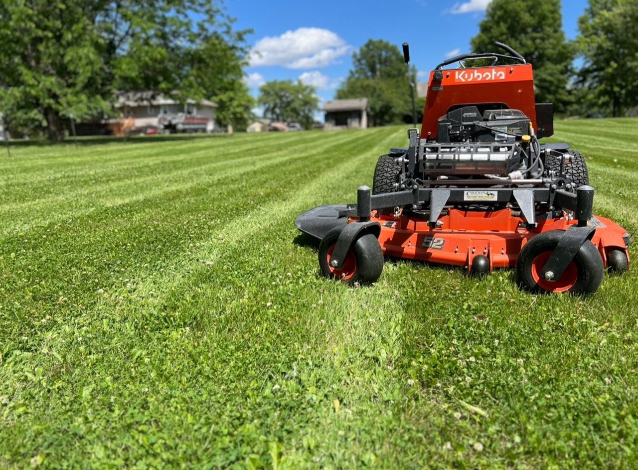 Commercial mower maintaining a large Kansas City metro lawn